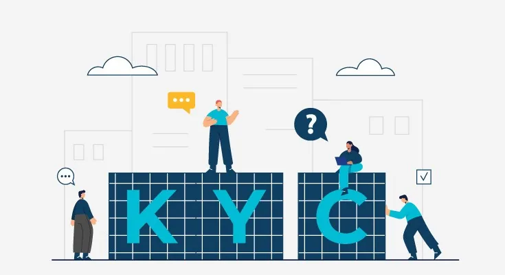 People verifying documents around large KYC letters